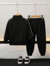 Stylish boys tracksuit set in navy blue with white stripes perfect for active play or casual wear Features a comfortable long sleeve jacket and matching pants