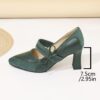 A pair of retro style embroidered womens high heel shoes in a pointed toe design