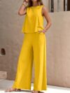 The Newness Cairo Sleeveless Wide Leg Set in white featuring a relaxed sleeveless top and wide leg pants perfect for a spring or summer day