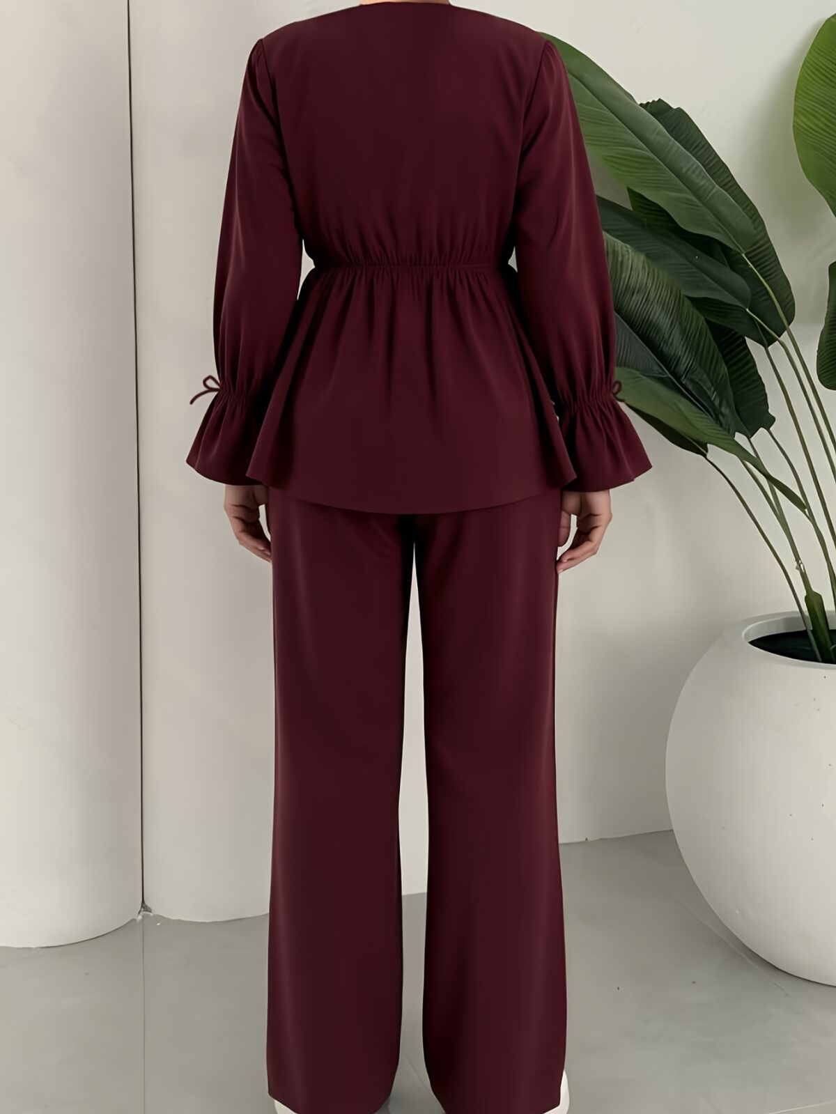 The Newness Milan Two Piece Pant Set in luxurious polyester A sophisticated and stylish two piece outfit perfect for any occasion
