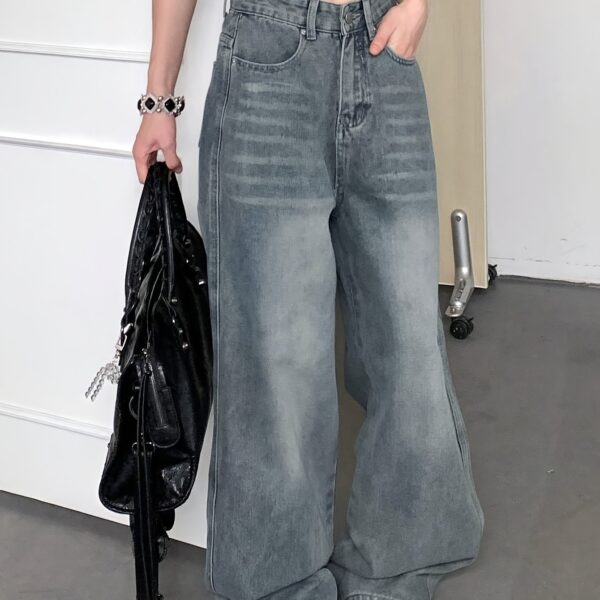 Newness Parisian High Waisted Wide Leg Jeans Flattering comfortable wide leg jeans in a chic style Model wearing light wash denim