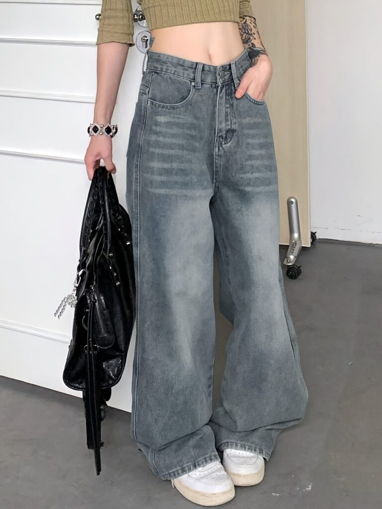 Newness Parisian High-Waisted Wide-Leg Jeans: Flattering, comfortable wide-leg jeans in a chic style. Model wearing light wash denim.