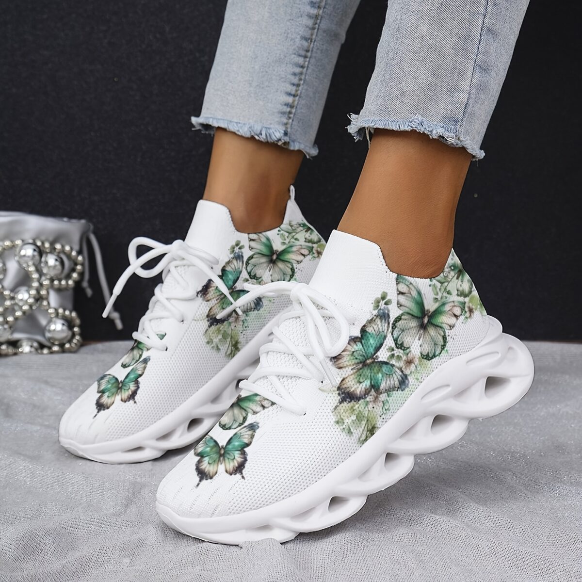 Newness Whimsical Butterfly Print Sneakers Chic and comfortable sneakers featuring a playful butterfly print perfect for any occasion