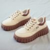 Newness chunky platform sneakers in white showcasing their platform sole and comfortable design Perfect for elevating any everyday outfit