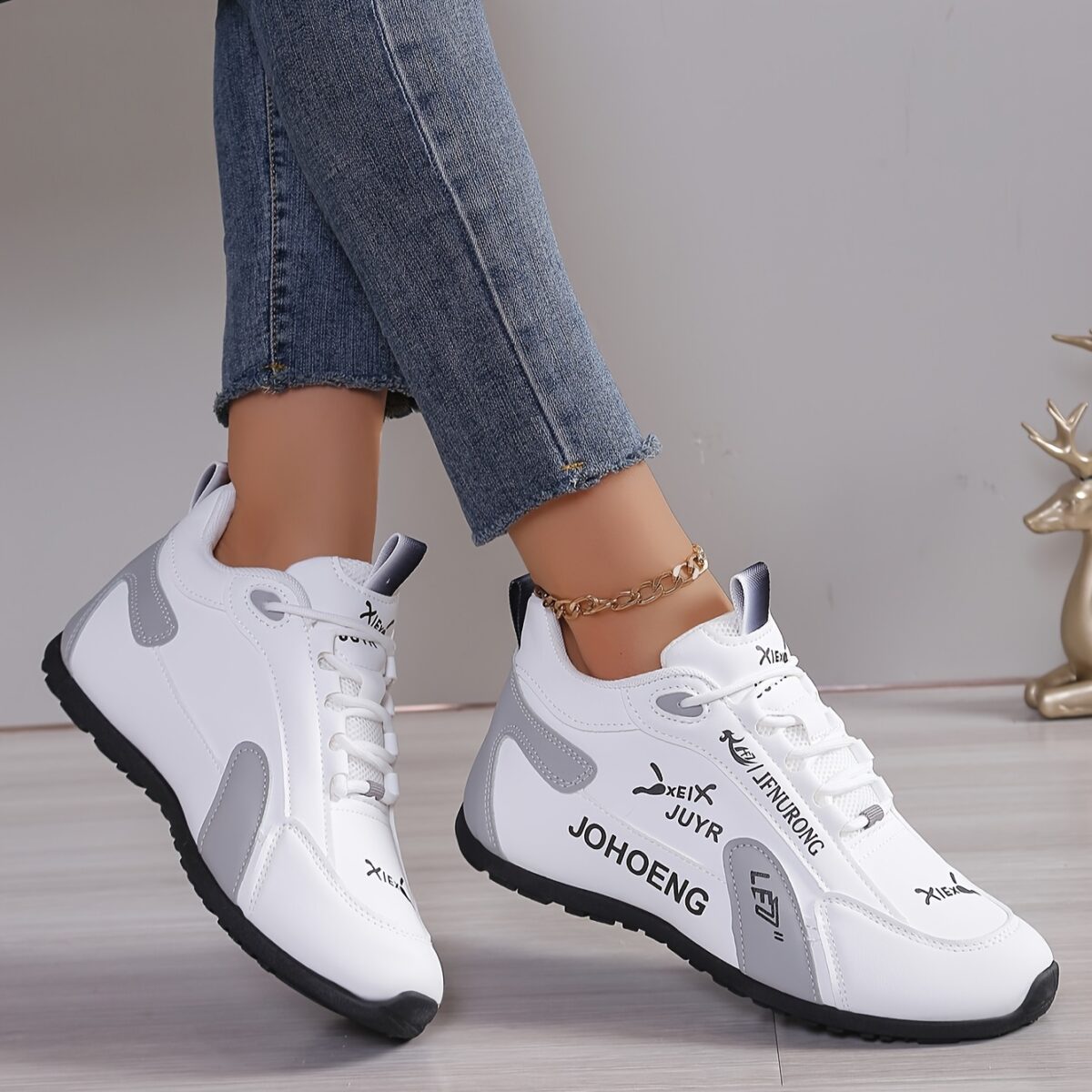 Newness City Chic Womens White Sneakers Chic sporty white sneakers perfect for everyday wear Close up view showcasing the stylish design and comfortable features