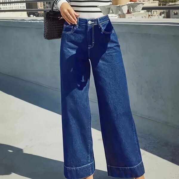 Newness Riviera High Waisted Bell Bottom Jeans A flattering pair of high waisted bell bottom jeans in a versatile wash perfect for any occasion
