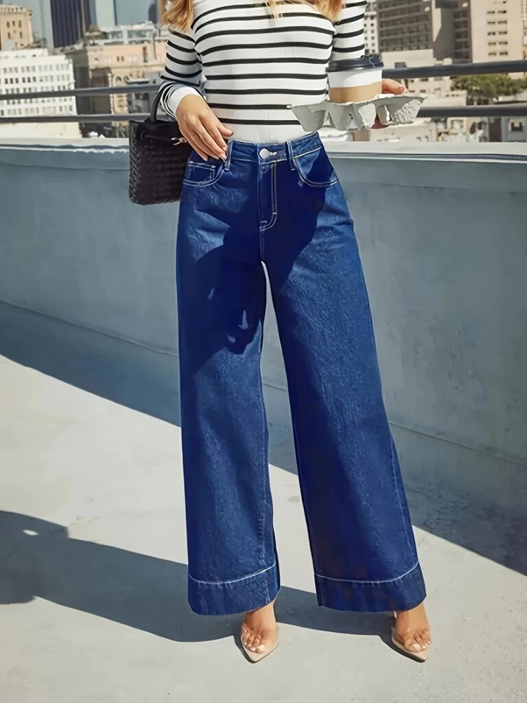 Newness Riviera High-Waisted Bell-Bottom Jeans: A flattering pair of high-waisted bell-bottom jeans in a versatile wash, perfect for any occasion.