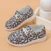 Adorable girls heart pattern loafers in a soft breathable fabric Perfect for everyday wear these slip on shoes offer both comfort and style