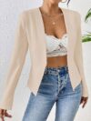 Flattering beige blazer for women featuring a chic asymmetrical hem perfect for both casual and formal occasions