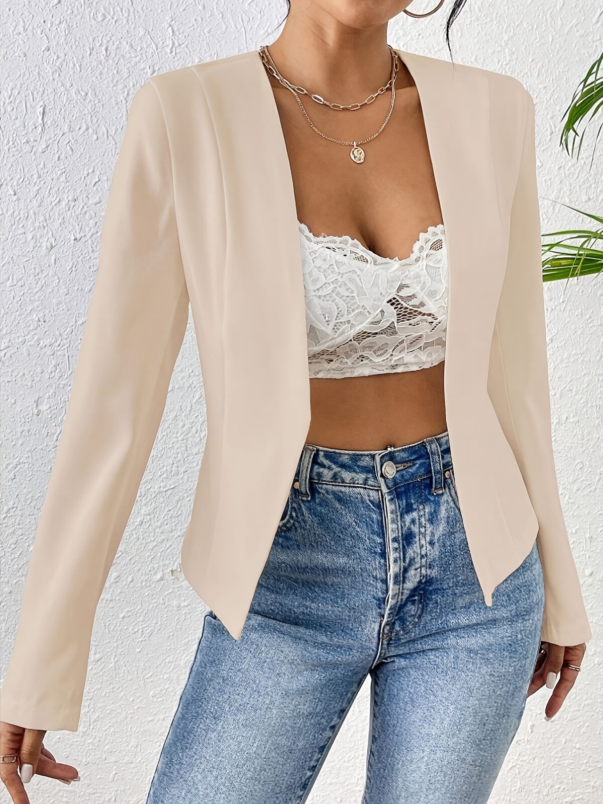 Flattering beige blazer for women featuring a chic asymmetrical hem perfect for both casual and formal occasions