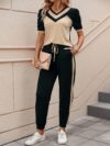 Stylish Cairo Color Block Pants Set by Newness A chic modern two piece outfit in a vibrant color block design