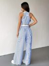 The Newness Riviera Striped Trouser Set in a flattering pose showcasing its relaxed fit and chic style Model is wearing the matching top and trousers