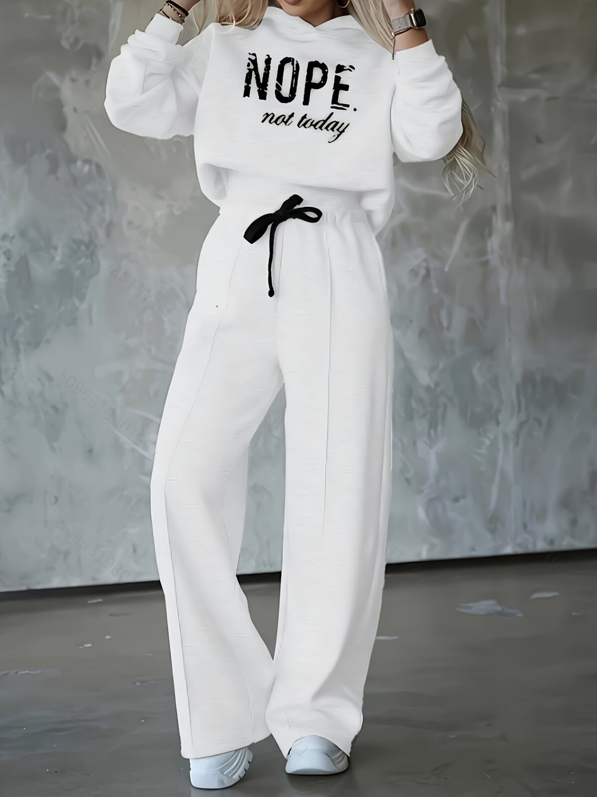 The Newness Effortless Chic Letter Print Lounge Set A stylish and comfortable two piece loungewear set featuring a relaxed modern silhouette and a chic letter print