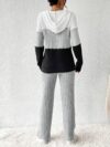 The Newness Riviera Color Block Hoodie Set in a flattering pose showcasing its vibrant color blocking and comfortable fit Perfect for spring or fall