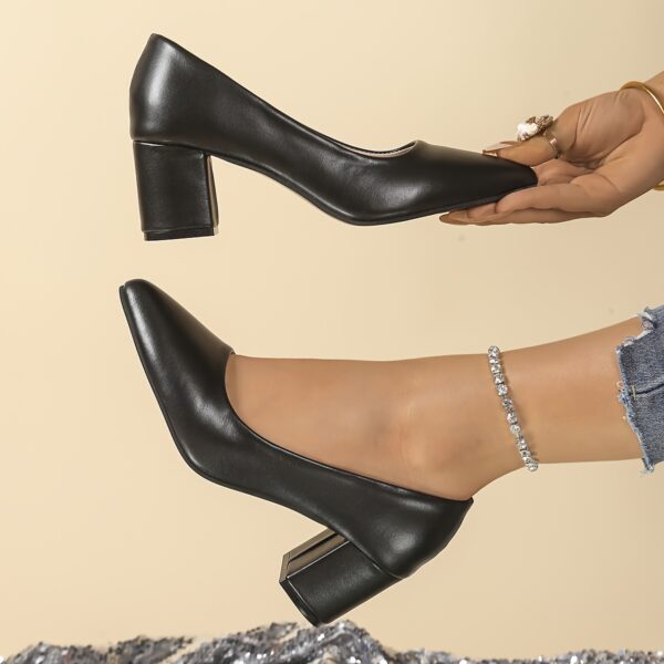 Newness Milan Black Chunky Heel Pumps Elevate your style with these comfortable and durable black pumps perfect for any occasion