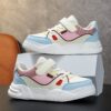 Colorful patchwork kids sneakers perfect for school or play showcasing breathable comfort and stylish design from Newness