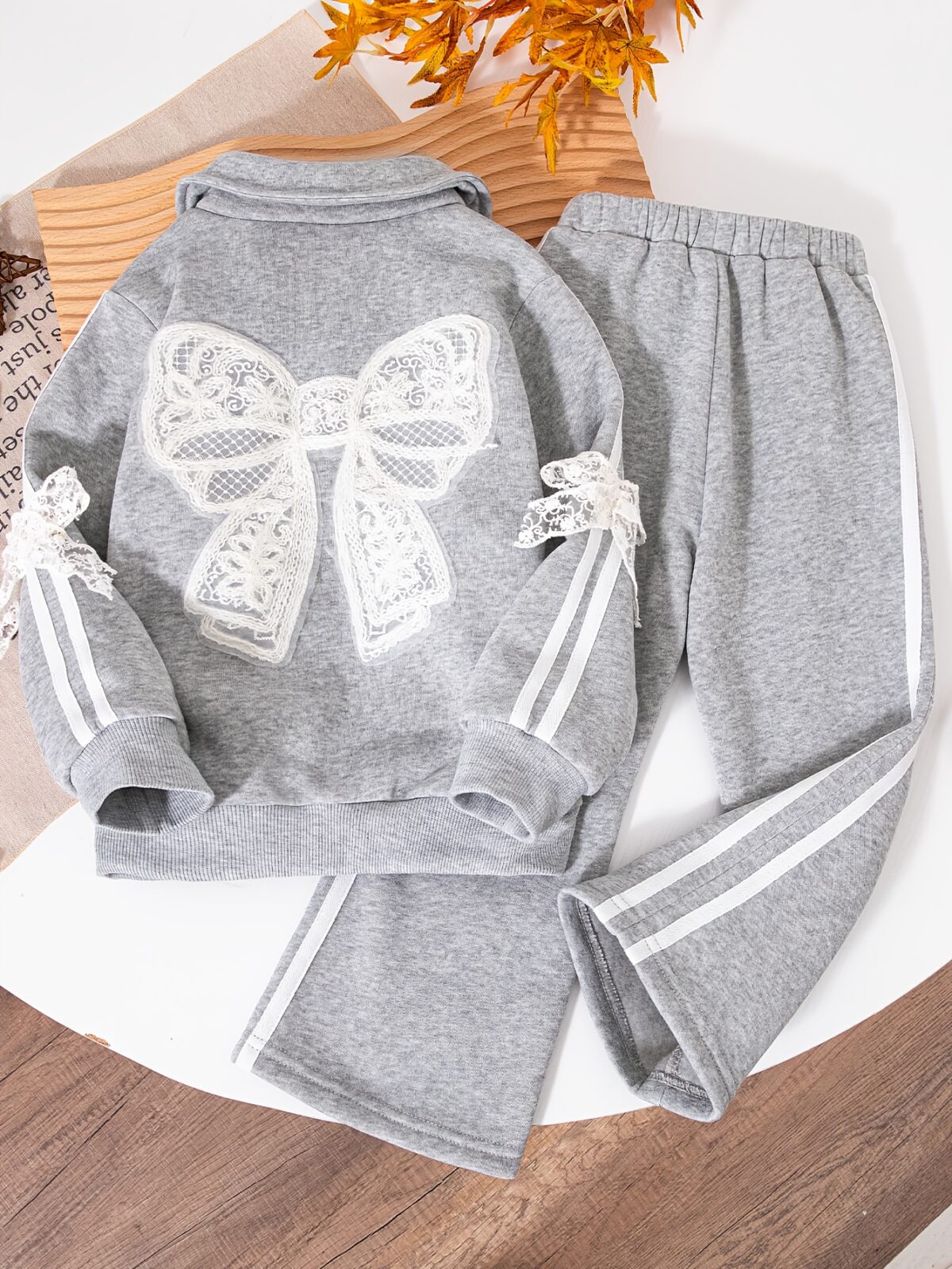 A stylish girls velvet two piece set in a rich color perfect for fall and winter
