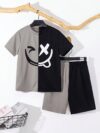 Adorable boy wearing a trendy color block set perfect for playtime school or any casual occasion The outfit features vibrant colors and a comfortable soft fabric