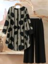 Model showcasing the Newness Nian Nian Printed Suit Set a sophisticated and effortlessly chic printed suit set perfect for any occasion