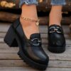 A pair of stylish chunky heel shoes designed for petite women featuring a thick sole and breathable design The shoes are shown in a spring or autumn setting