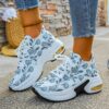 Newness Botanical Breeze Floral Print Sneakers Chic and comfortable floral print sneakers perfect for any occasion Showcasing a stylish design with vibrant floral details