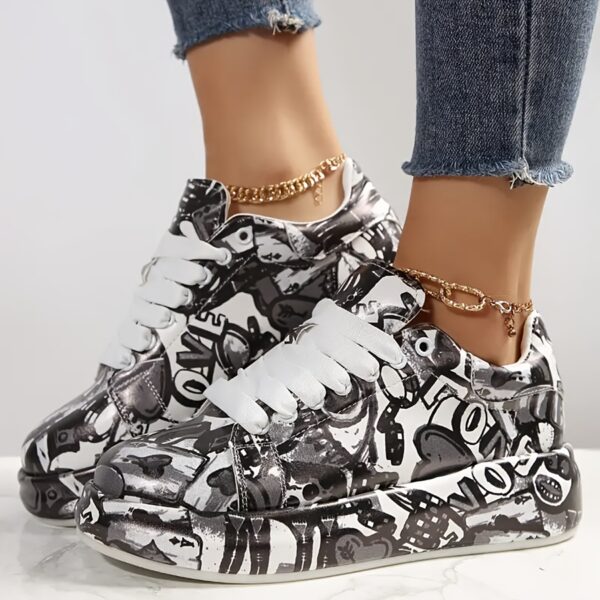 Newness Monochrome Graphic Print Sneakers Stylish and comfortable sneakers with a modern monochrome graphic design perfect for everyday wear
