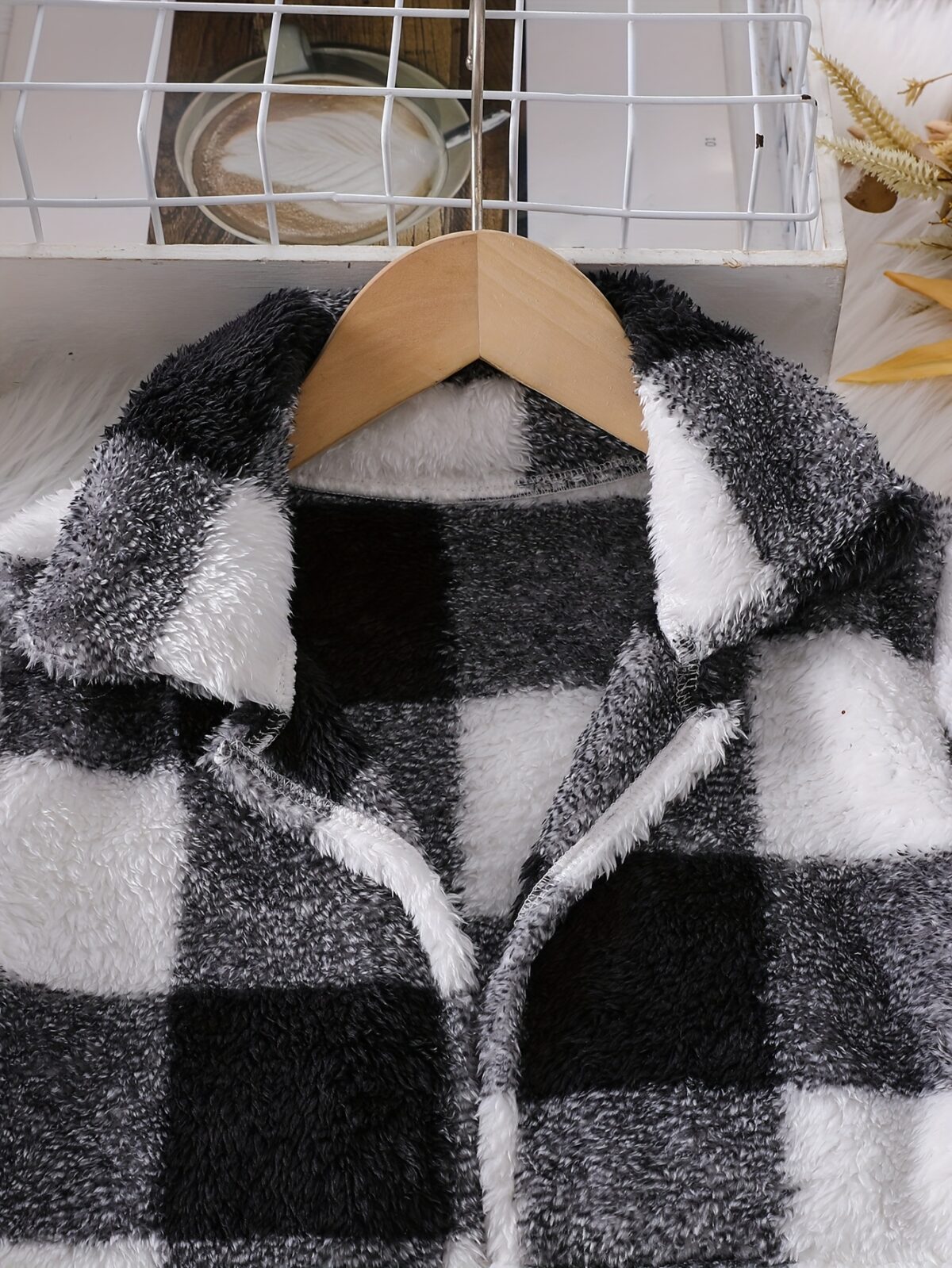 Stylish woman wearing a comfortable and chic plaid dress set ideal for autumn outings