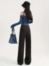 Model wearing Newness Seoul Street Style High Waisted Wide Leg Jeans showcasing the comfortable fit and chic style The jeans are a wide leg style with a high waist