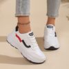 Newness City Chic White Accent Sneakers Modern white sneakers with stylish accents perfect for any occasion
