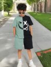 Adorable boy wearing a trendy color block set perfect for playtime school or any casual occasion The outfit features vibrant colors and a comfortable soft fabric