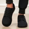 Newness Effortless Stride Wide Fit Sneakers in white showcasing the comfortable design and stylish look Perfect for all day wear