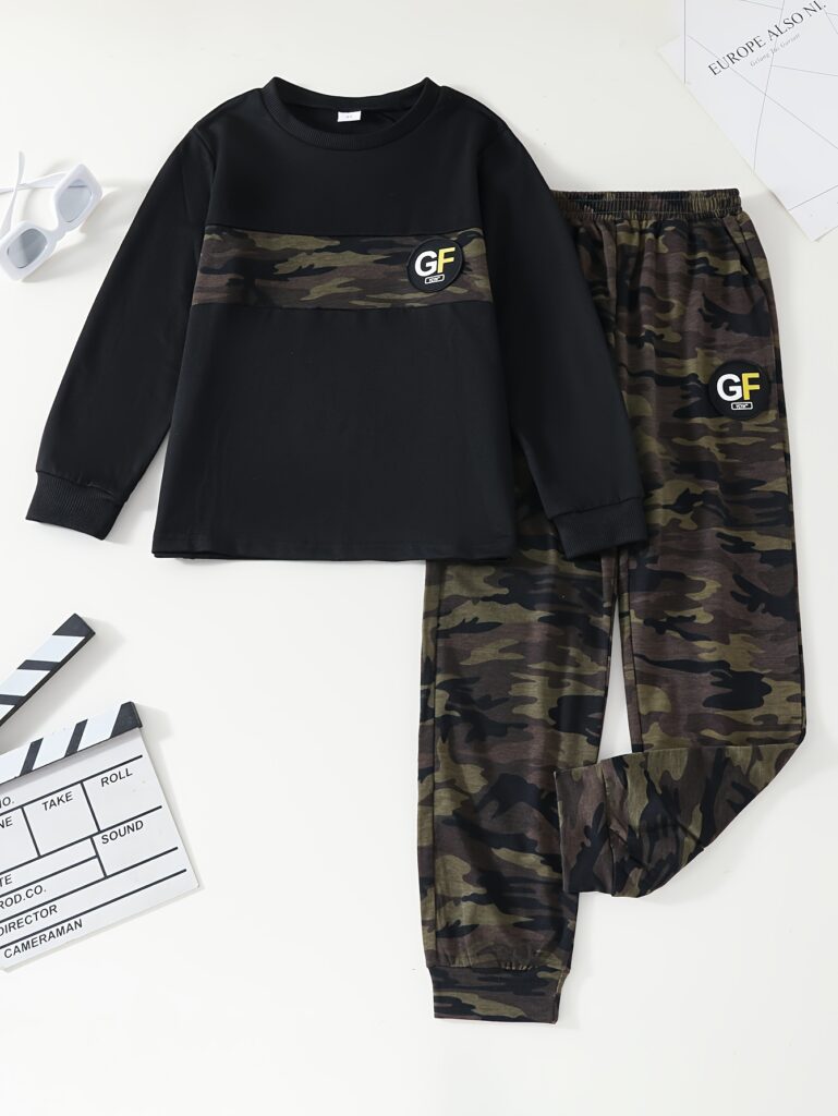 Cool teenage boy model wearing a stylish camouflage pant set, featuring a crew neck top and camouflage pants, ideal for spring or fall.