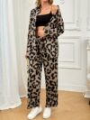 Stylish and sophisticated womens Safari Chic Leopard Print Pants Set from Newness The two piece set includes a matching top and pants both featuring a chic leopard print