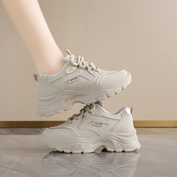 Womens light beige chunky sneakers with thick rubber sole showcasing lace up design and breathable fabric lining