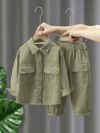 Stylish boys cargo pocket set in a comfortable cotton blend perfect for playtime and adventures The outfit features multiple pockets for carrying treasures