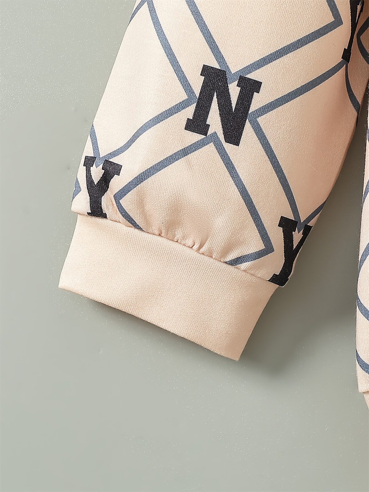 Stylish boys two piece outfit featuring a trendy N Y English letter print long sleeve t shirt and matching pants Perfect for city adventures and everyday wear