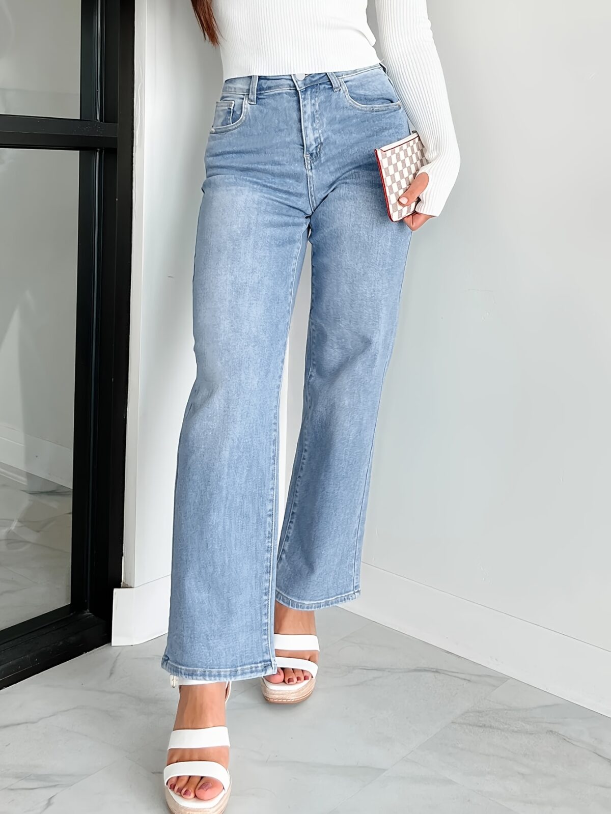 Effortless Chic Wide Leg Jeans by Newness in vintage washed denim showcasing a flattering wide leg silhouette and comfortable fit