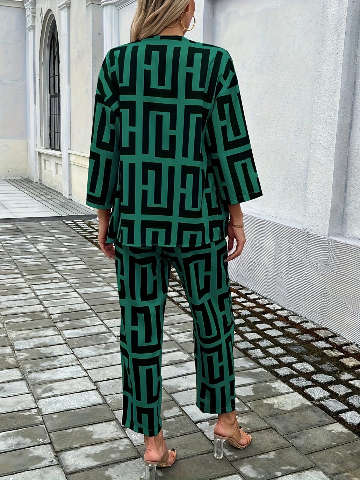 The Newness Modern Muse Geometric Print Set a chic two piece outfit featuring a modern geometric print perfect for any occasion