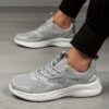 A pair of Newness womens casual walking shoes in a solid color showcasing their lightweight and comfortable design