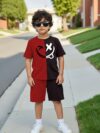 Adorable boy wearing a trendy color block set perfect for playtime school or any casual occasion The outfit features vibrant colors and a comfortable soft fabric
