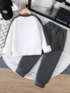 Adorable boys cartoon print sweatshirt and pants set perfect for spring and autumn The comfy outfit is ideal for playtime school or casual wear