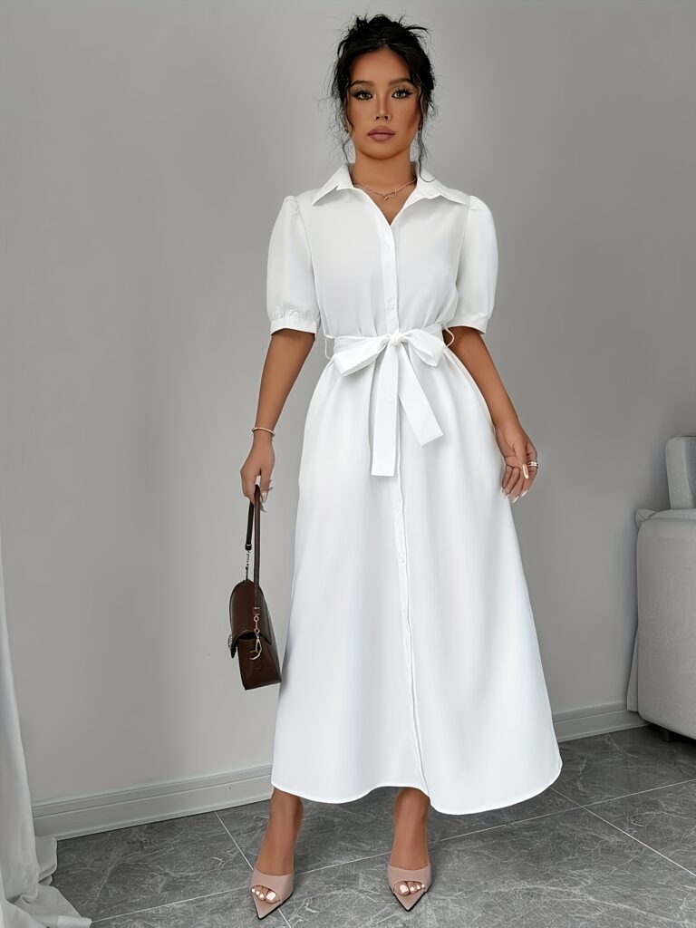 The Santorini White Tie Waist Dress: Effortless chic meets modern elegance in a pristine white dress, perfect for spring and summer occasions. A flattering tie waist accentuates the silhouette.