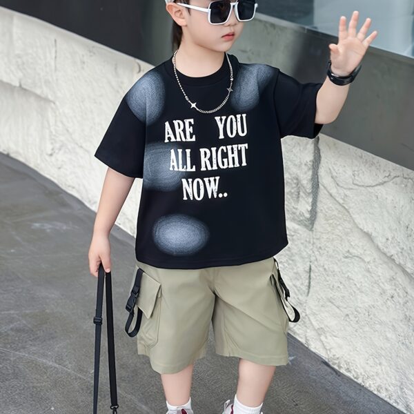 Stylish boys' summer outfit: alphabet print t-shirt and cargo shorts set from Newness. Perfect for summer adventures!