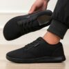 Newness Effortless Stride Wide Fit Sneakers in white showcasing the comfortable design and stylish look Perfect for all day wear