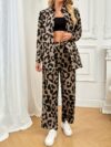 Stylish and sophisticated womens Safari Chic Leopard Print Pants Set from Newness The two piece set includes a matching top and pants both featuring a chic leopard print