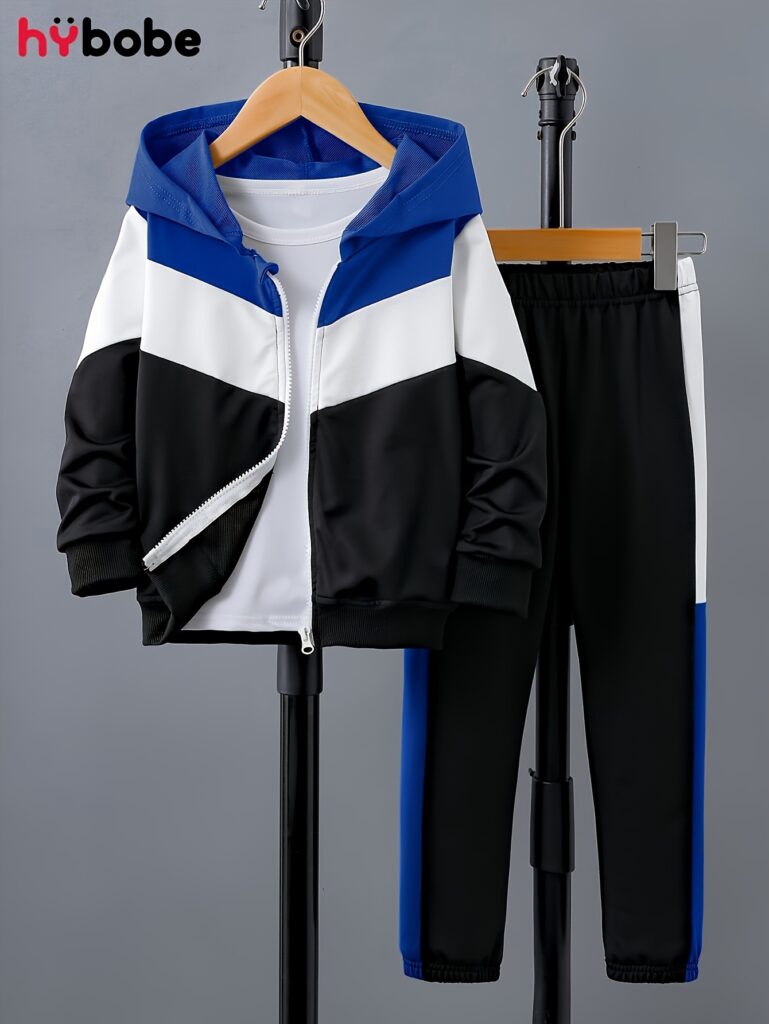 Stylish boy wearing a Newness Autumn Adventures Boys Color Block Set, a retro casual two-piece outfit in trendy color blocks, perfect for autumn. The set includes a hooded jacket and pants.