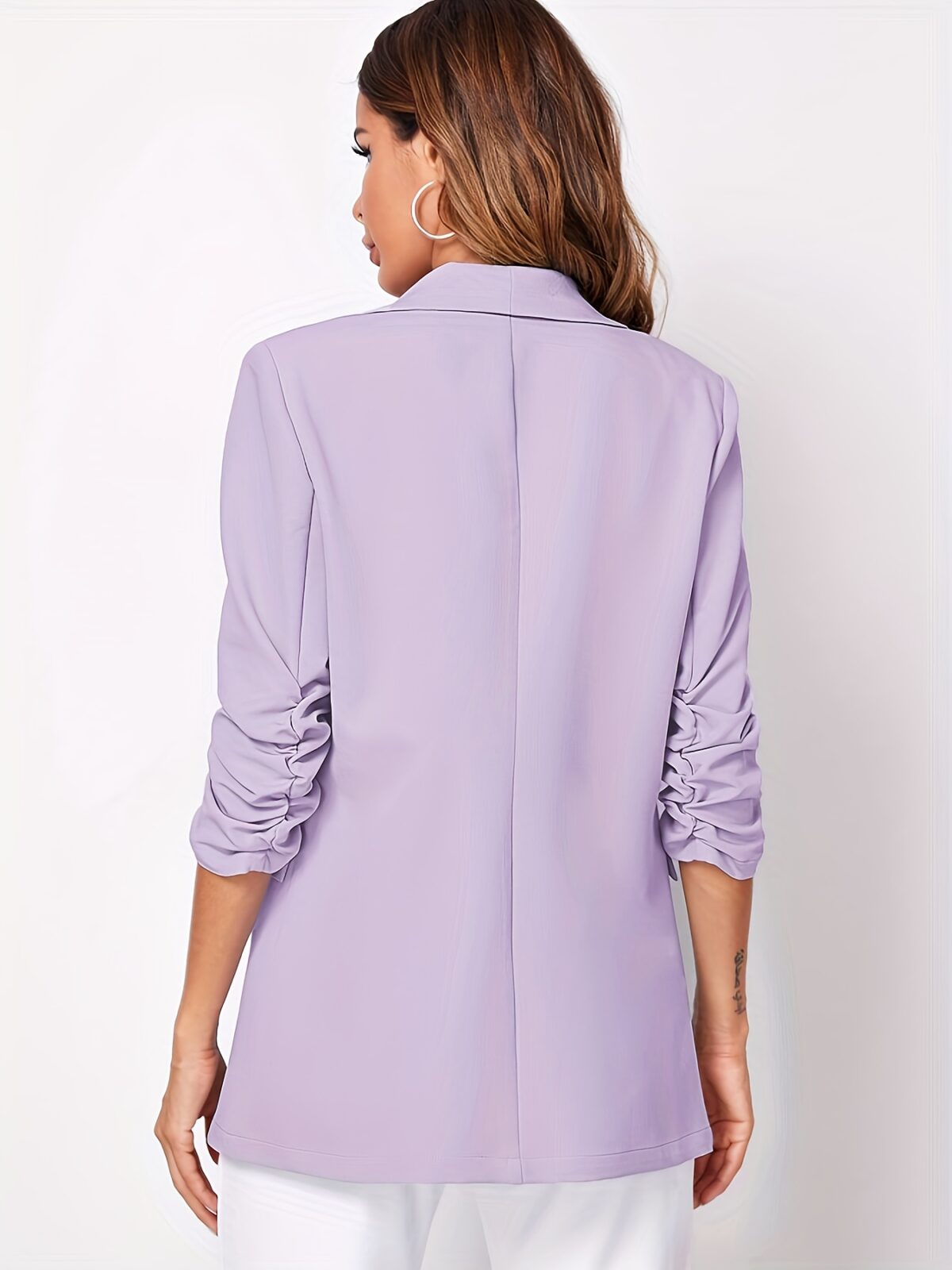 Modern Muse Womens Light Blue Casual Office Blazer a versatile light blue blazer perfect for the office or casual wear Flattering silhouette Model wearing a light blue blazer