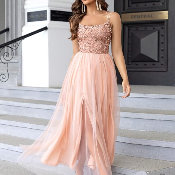 Dazzle in our Evening Sparkle Pink Sequin Evening Gown. This stunning off-the-shoulder gown features shimmering sequins and elegant tulle, perfect for your next formal event.