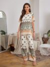 The Newness Riviera Rendezvous Geometric Print Set A stylish two piece outfit featuring a vibrant geometric print perfect for summer occasions Model showcases effortless chic