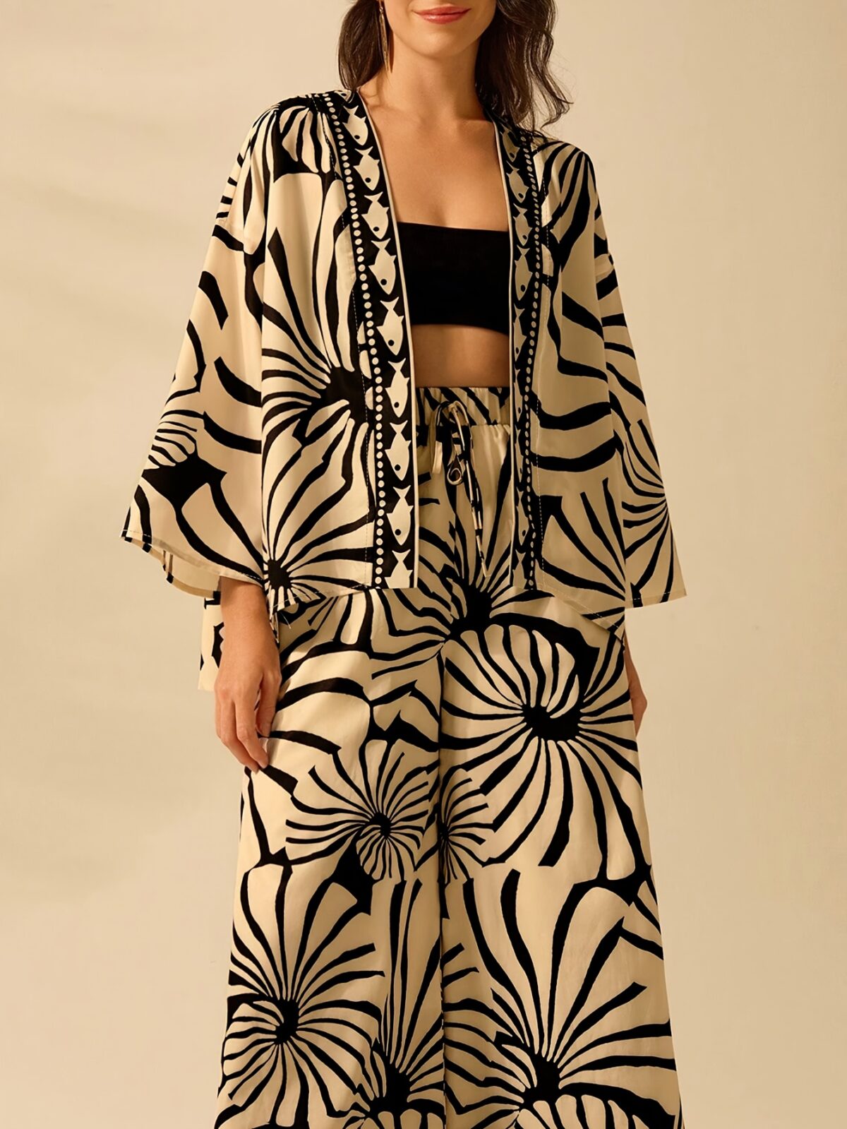 Effortlessly chic Casablanca Geometric Print Kimono from Newness perfect for summer Features a striking geometric print and relaxed fit